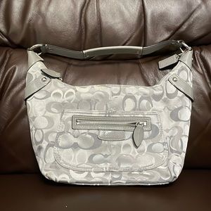 Coach hobo bag. Small stain on bottom (in pic) Approx 10” wide 8” high.